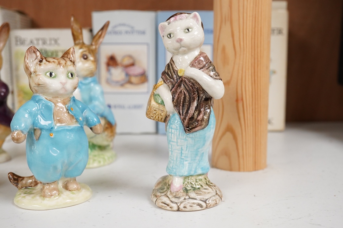Nine Beswick Beatrix Potter figures, some stamped F. Warne & Co , largest 17cm high